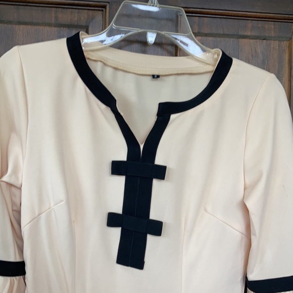 Butter with black trim balloon sleeve midi dress. - Picture 2 of 3